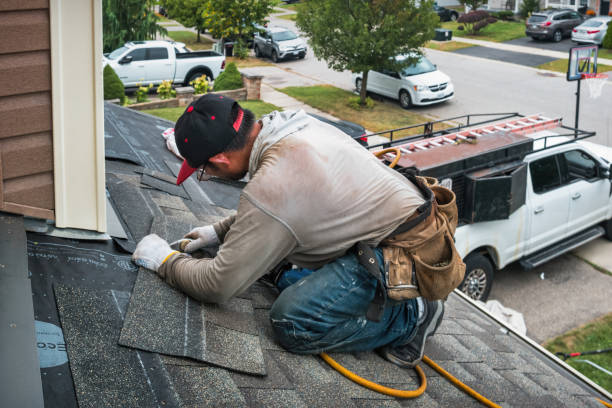 Professional Roofing technician working in Greenacres, CA